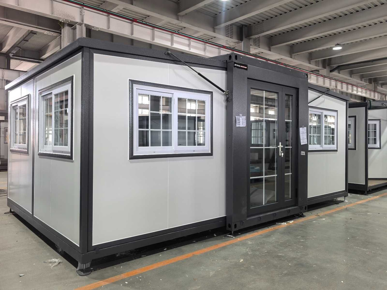 Stahlworks Deluxe (19ft*13ft) - Wohncontainer: das Bild 1 Stahlworks Deluxe (19ft*13ft) - Wohncontainer: das Bild 1