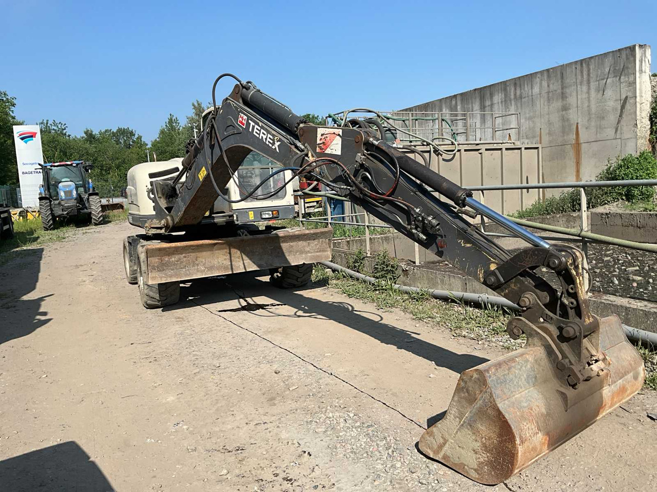 Terex Tw85 - Baggerlader: das Bild 2 Terex Tw85 - Baggerlader: das Bild 2