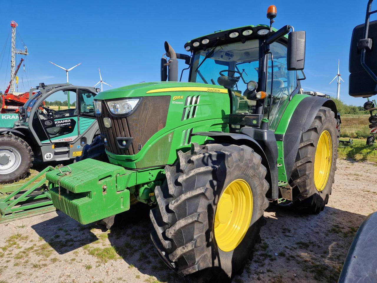 John Deere 6195R - Traktor: das Bild 1 John Deere 6195R - Traktor: das Bild 1