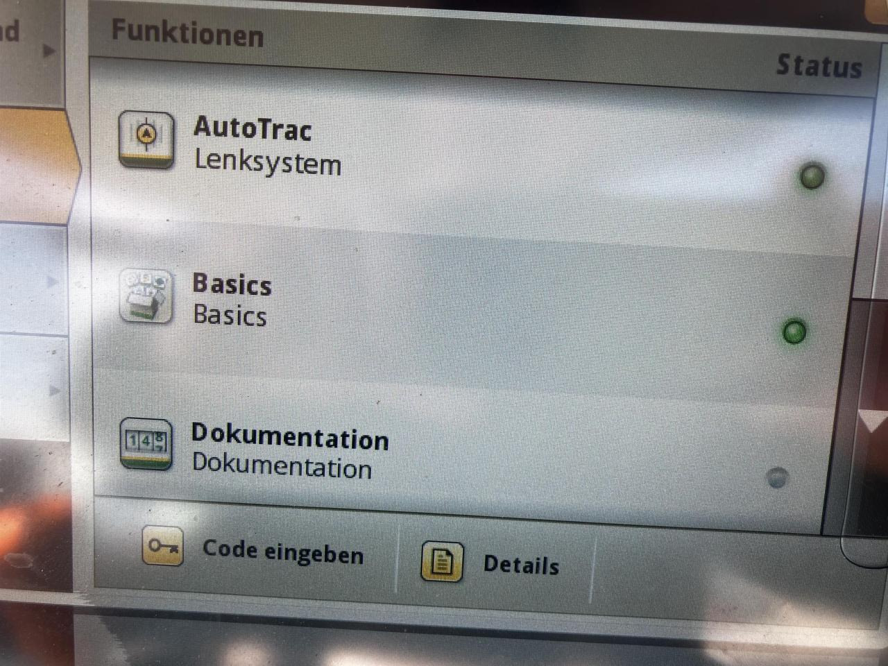 Traktor John Deere 6215R: das Bild 11