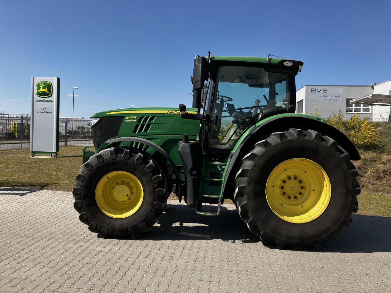 John Deere 6215R - Traktor: das Bild 1 John Deere 6215R - Traktor: das Bild 1