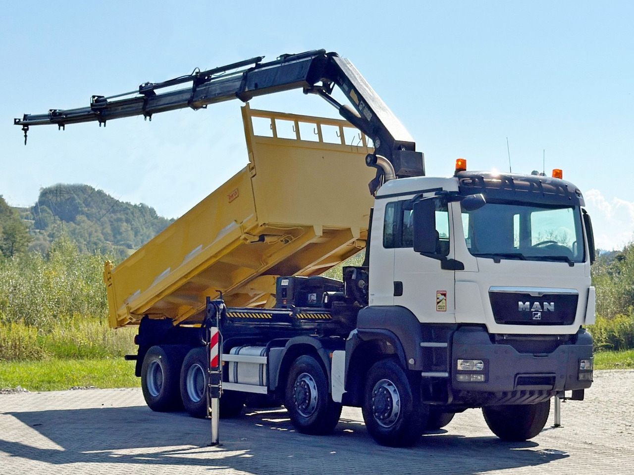 MAN TGS 32.510 * HIAB 288 EP - 5HIDUO/ FUNK * 8x8 - Kipper, Autokran: das Bild 2 MAN TGS 32.510 * HIAB 288 EP - 5HIDUO/ FUNK * 8x8 - Kipper, Autokran: das Bild 2