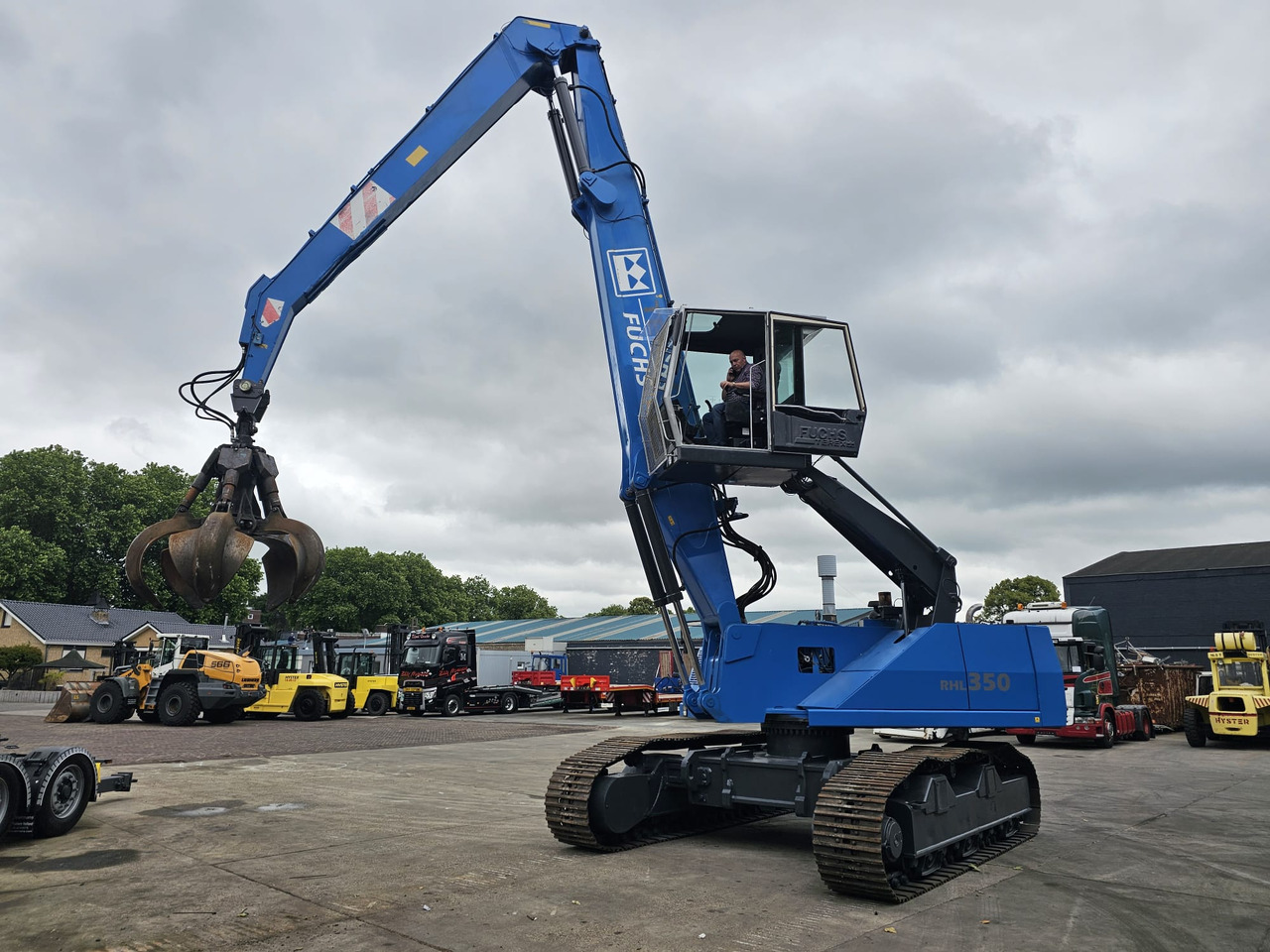 Fuchs RHL 350 Materialhandler With Adjustable Tracks - Umschlagbagger: das Bild 1 Fuchs RHL 350 Materialhandler With Adjustable Tracks - Umschlagbagger: das Bild 1