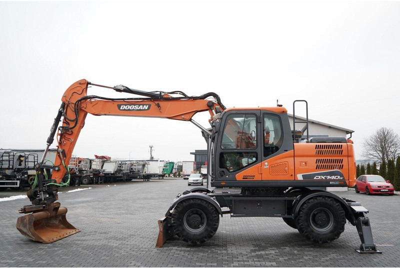 Doosan DX 140W / KOPARKA KOŁOWA / JOYSTICK / POWERTILT OBROTNICA - Mobilbagger: das Bild 2 Doosan DX 140W / KOPARKA KOŁOWA / JOYSTICK / POWERTILT OBROTNICA - Mobilbagger: das Bild 2