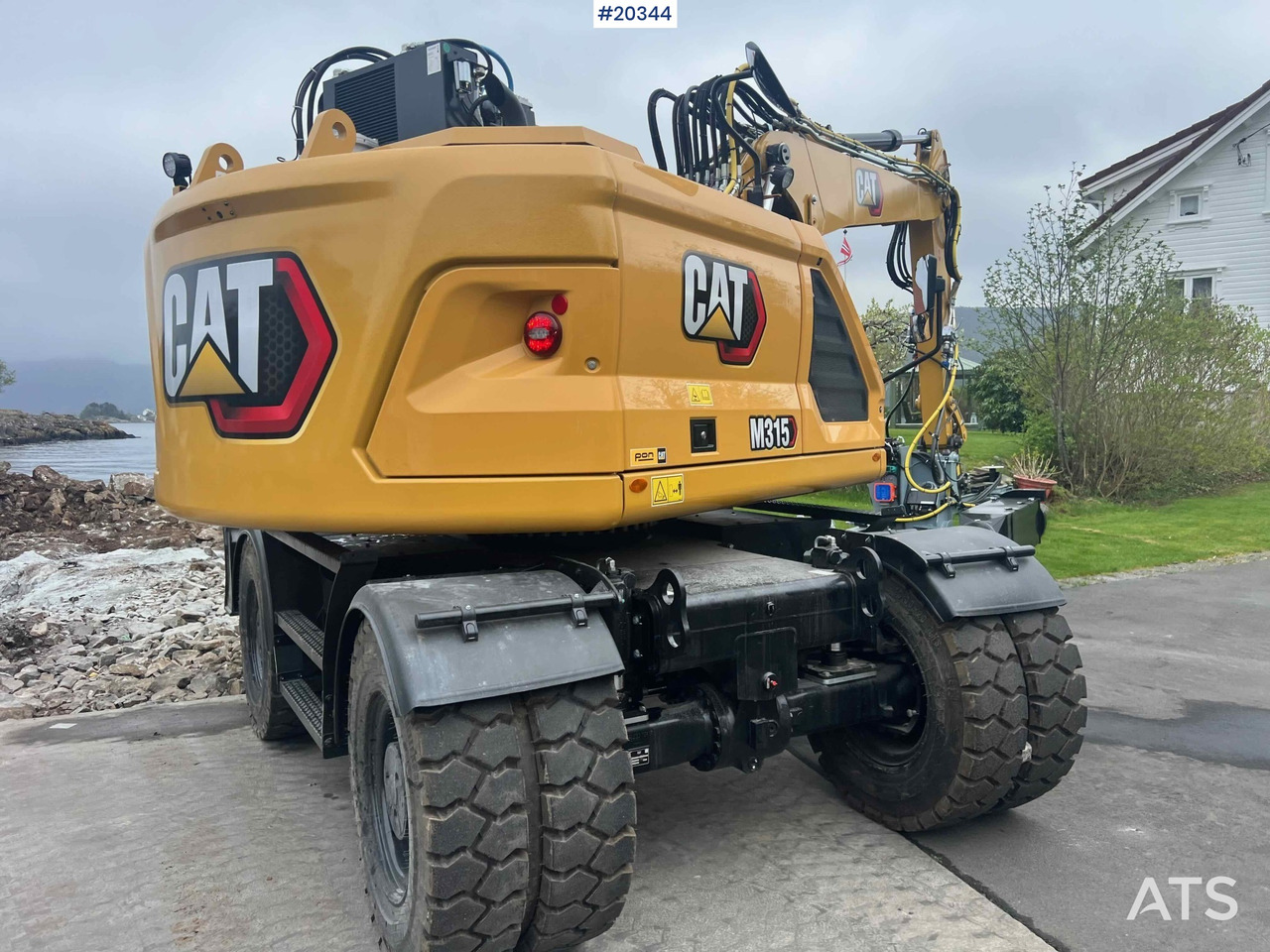 Bagger Caterpillar M315: das Bild 5