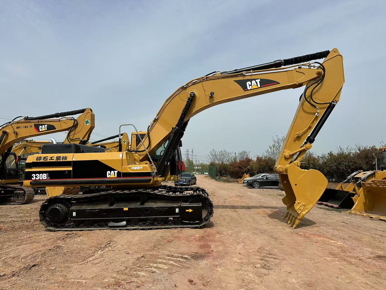 CATERPILLAR 330BL - Bagger: das Bild 2 CATERPILLAR 330BL - Bagger: das Bild 2