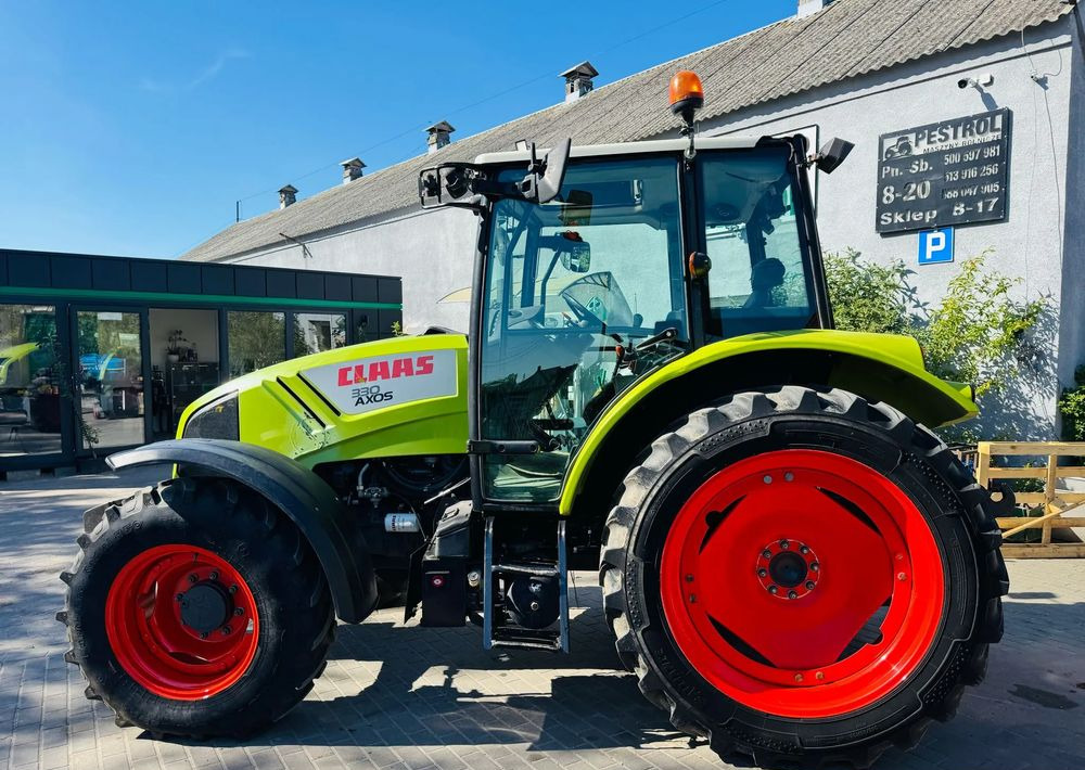 Claas Axos 330 - Traktor: das Bild 2 Claas Axos 330 - Traktor: das Bild 2