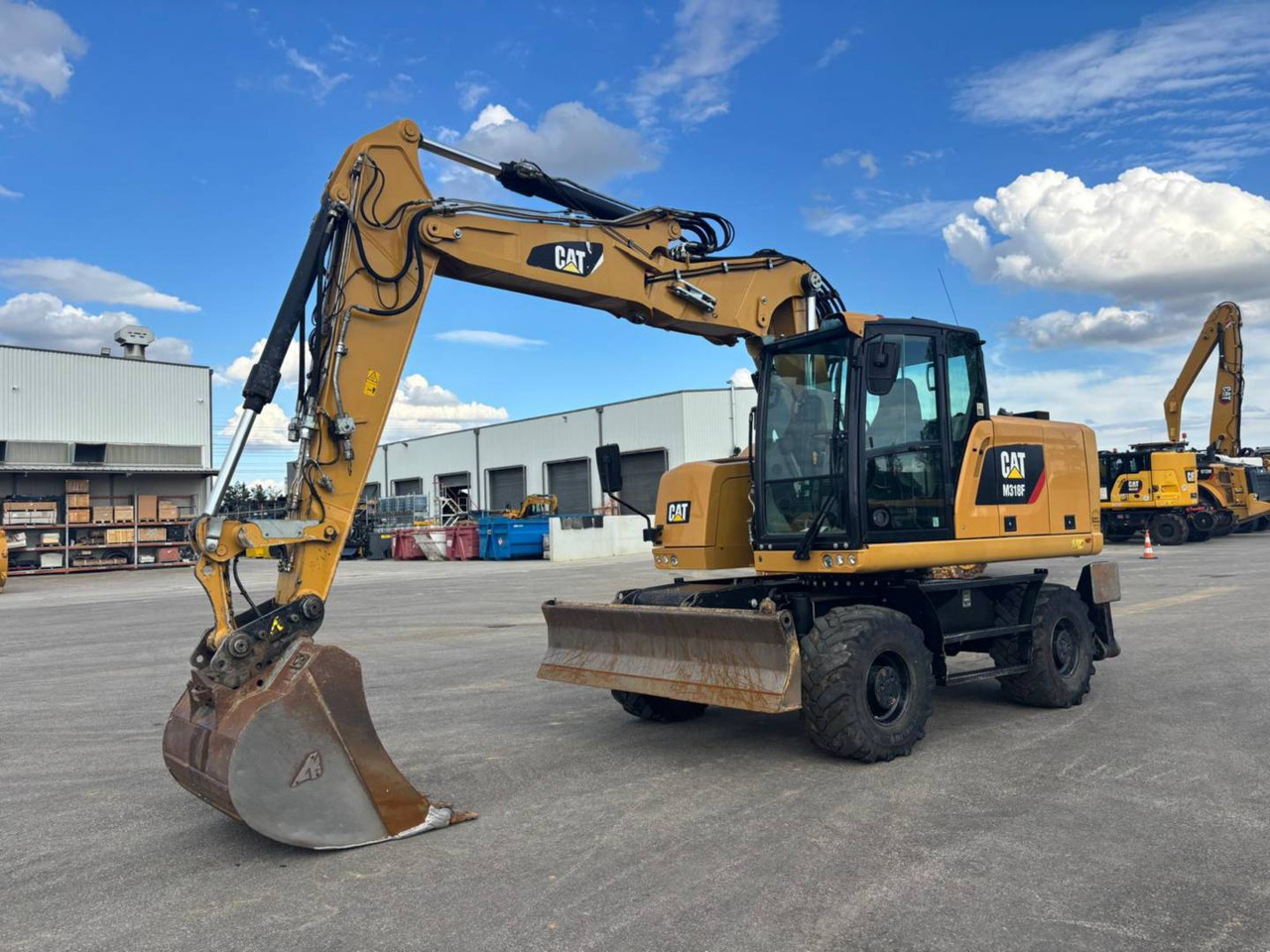 CAT M318F IVC - Mobilbagger: das Bild 1 CAT M318F IVC - Mobilbagger: das Bild 1