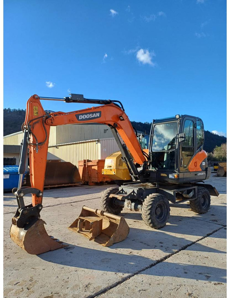 DOOSAN INFRACORE AMERICA CORP. DX57W-7 - Mobilbagger: das Bild 1 DOOSAN INFRACORE AMERICA CORP. DX57W-7 - Mobilbagger: das Bild 1