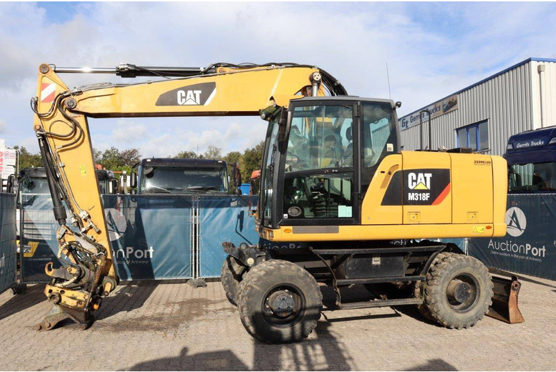 Caterpillar M318F - Mobilbagger: das Bild 1 Caterpillar M318F - Mobilbagger: das Bild 1