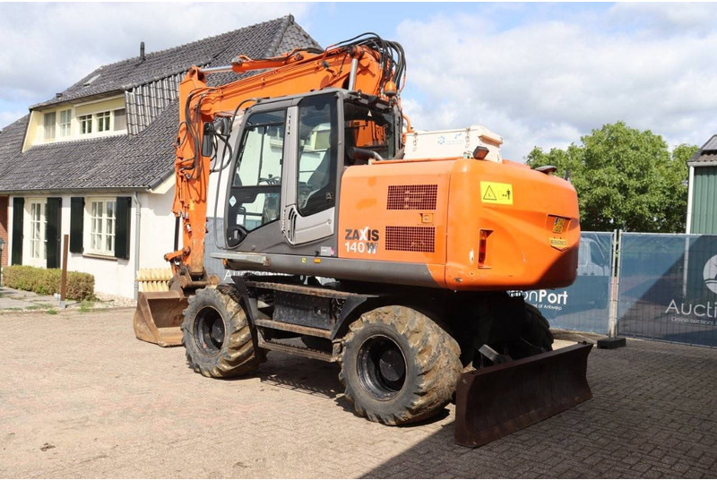 Hitachi ZX140W-3 - Mobilbagger: das Bild 4 Hitachi ZX140W-3 - Mobilbagger: das Bild 4