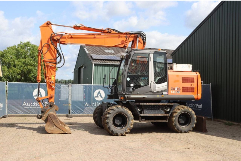 Hitachi ZX140W-3 - Mobilbagger: das Bild 1 Hitachi ZX140W-3 - Mobilbagger: das Bild 1
