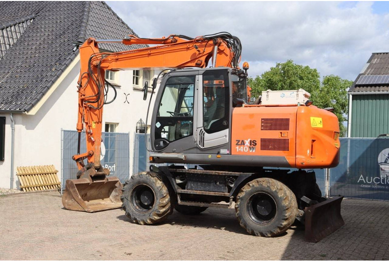 Hitachi ZX140W-3 - Mobilbagger: das Bild 3 Hitachi ZX140W-3 - Mobilbagger: das Bild 3