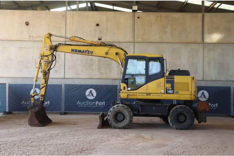 Komatsu PW140-7 - Mobilbagger: das Bild 2 Komatsu PW140-7 - Mobilbagger: das Bild 2