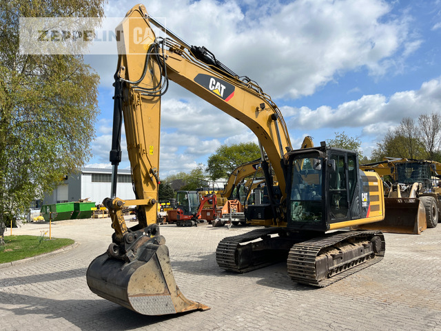 Cat 318EL - Kettenbagger: das Bild 1 Cat 318EL - Kettenbagger: das Bild 1
